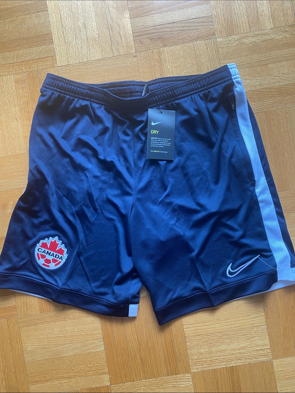 Nike Men’s Navy Athletic Shorts with Light Blue Stripe